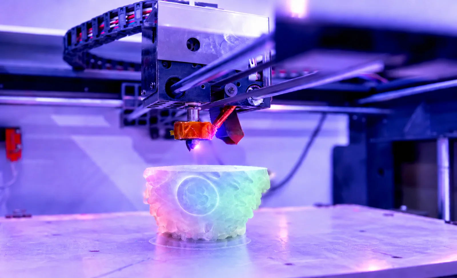 Colorful object being fabricated on a 3D printer